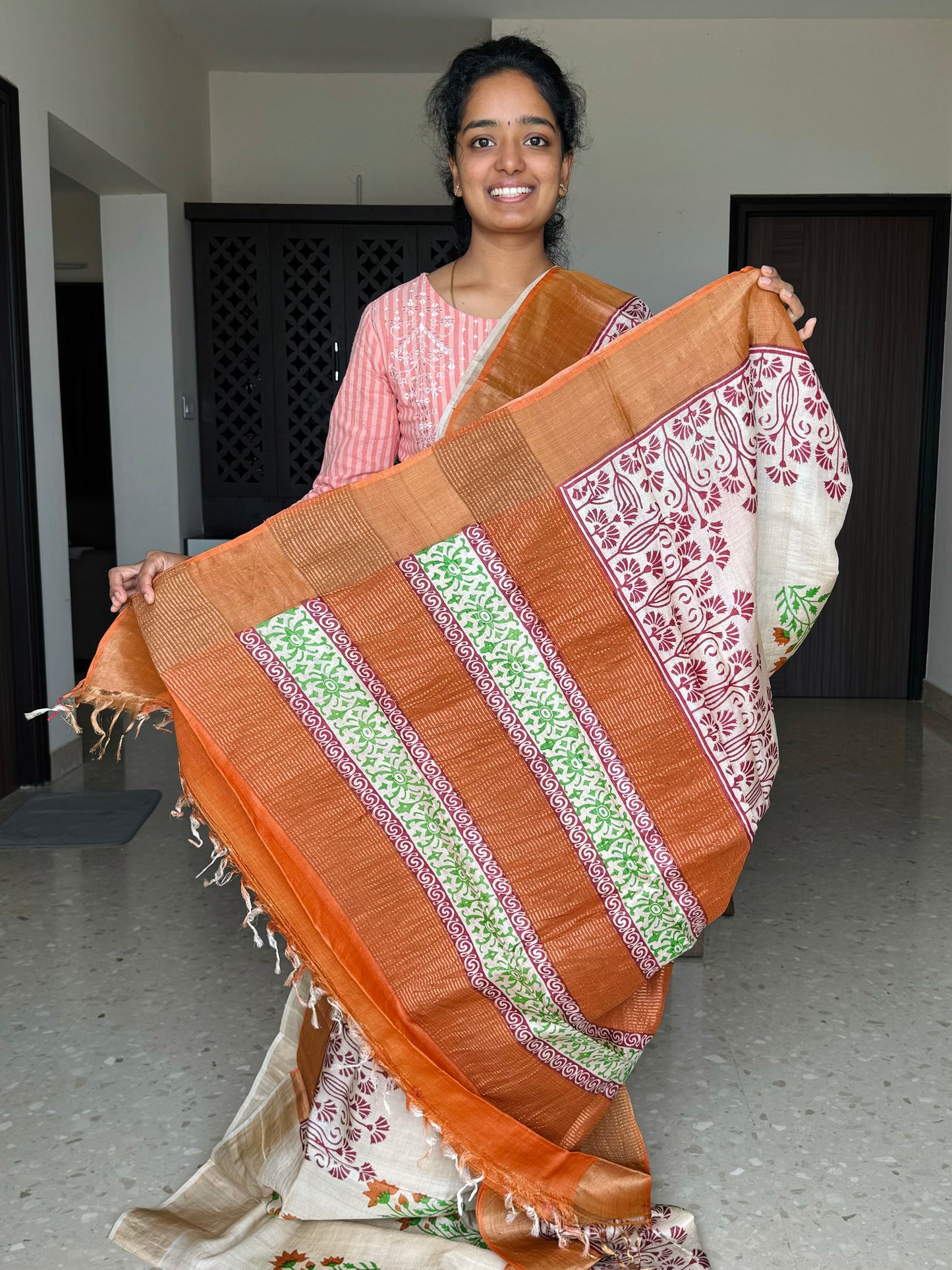 Cream and Orange Tussar Silk Saree with Prints