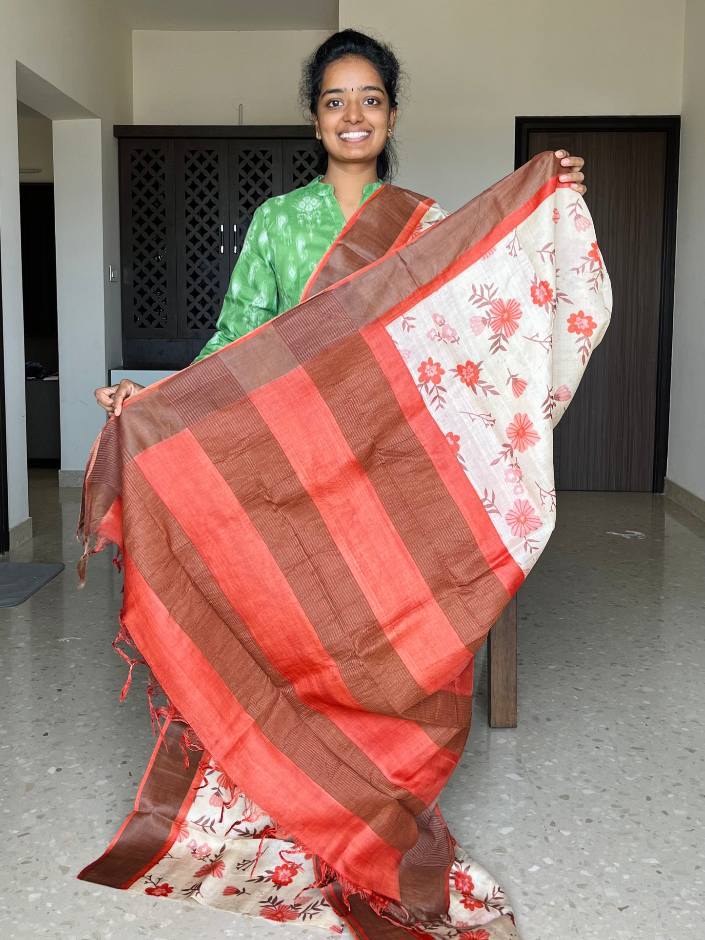 Cream and Orange Tussar Silk Saree with Prints