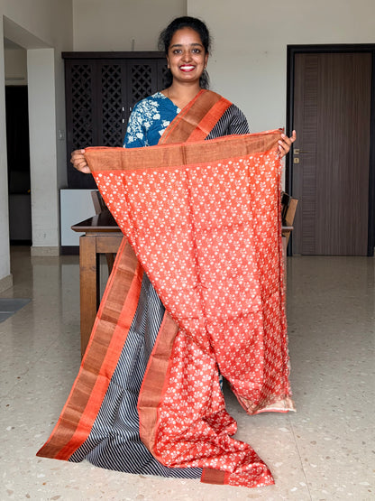 Black and Orange Tussar Silk Saree with Prints
