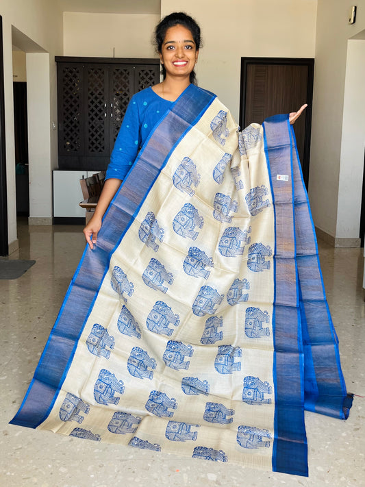 Cream and Blue Tussar Silk Saree with Prints