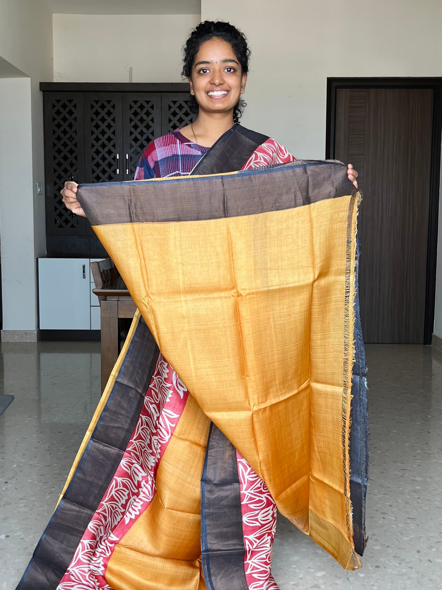 Yellow, Red and Black Tussar Silk Saree with Prints