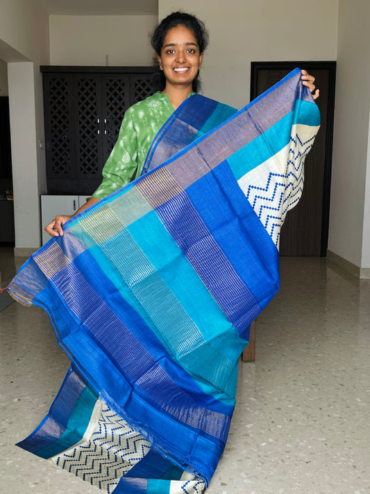 Cream and Blue Tussar Silk Saree with Prints