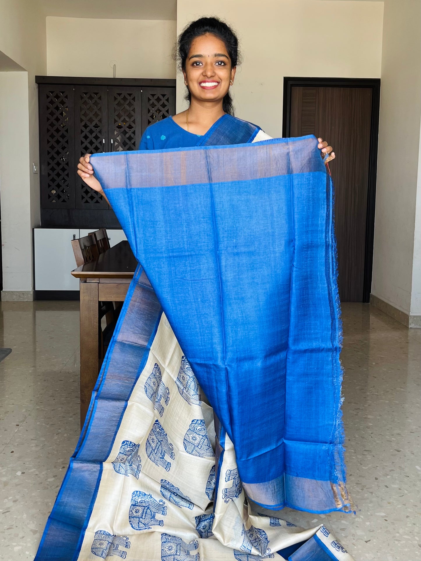 Cream and Blue Tussar Silk Saree with Prints