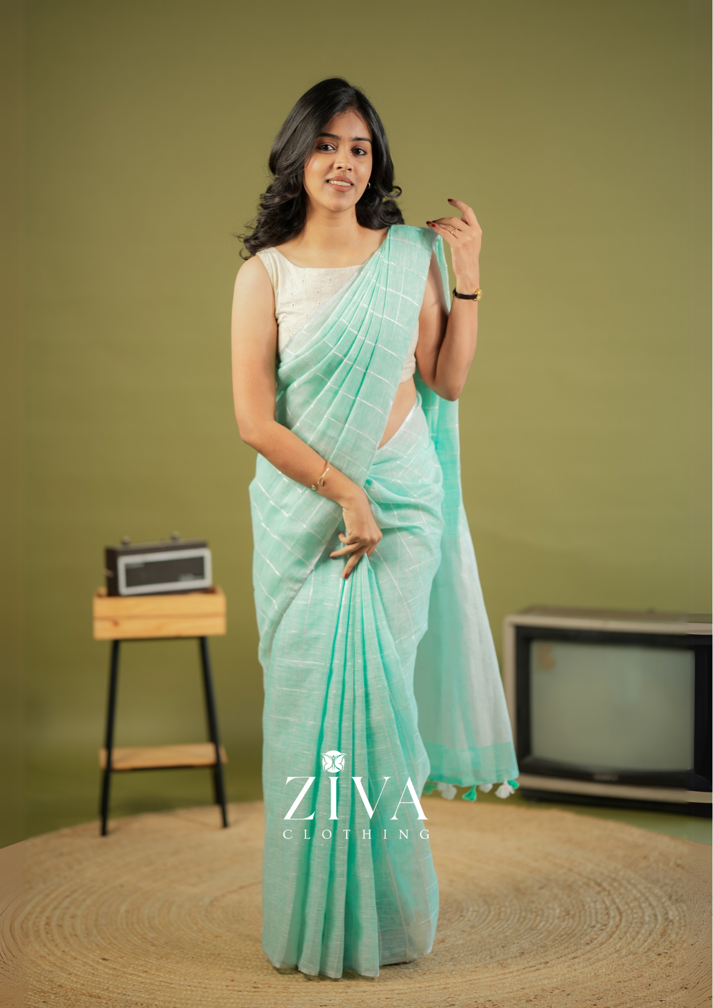 Pastel Green Linen Saree Woven With Sequins