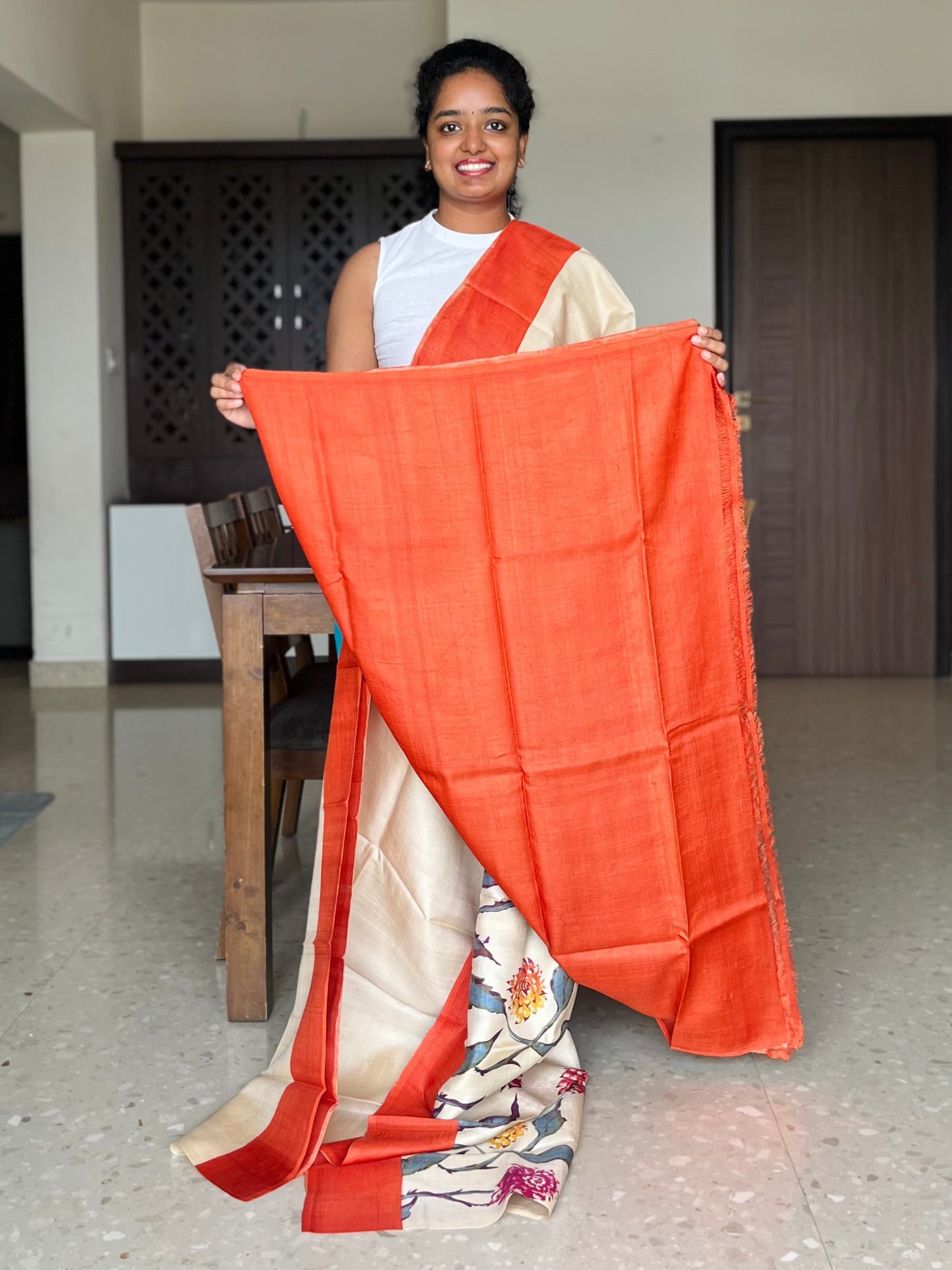 Cream and Orange Tussar Silk Saree with Prints