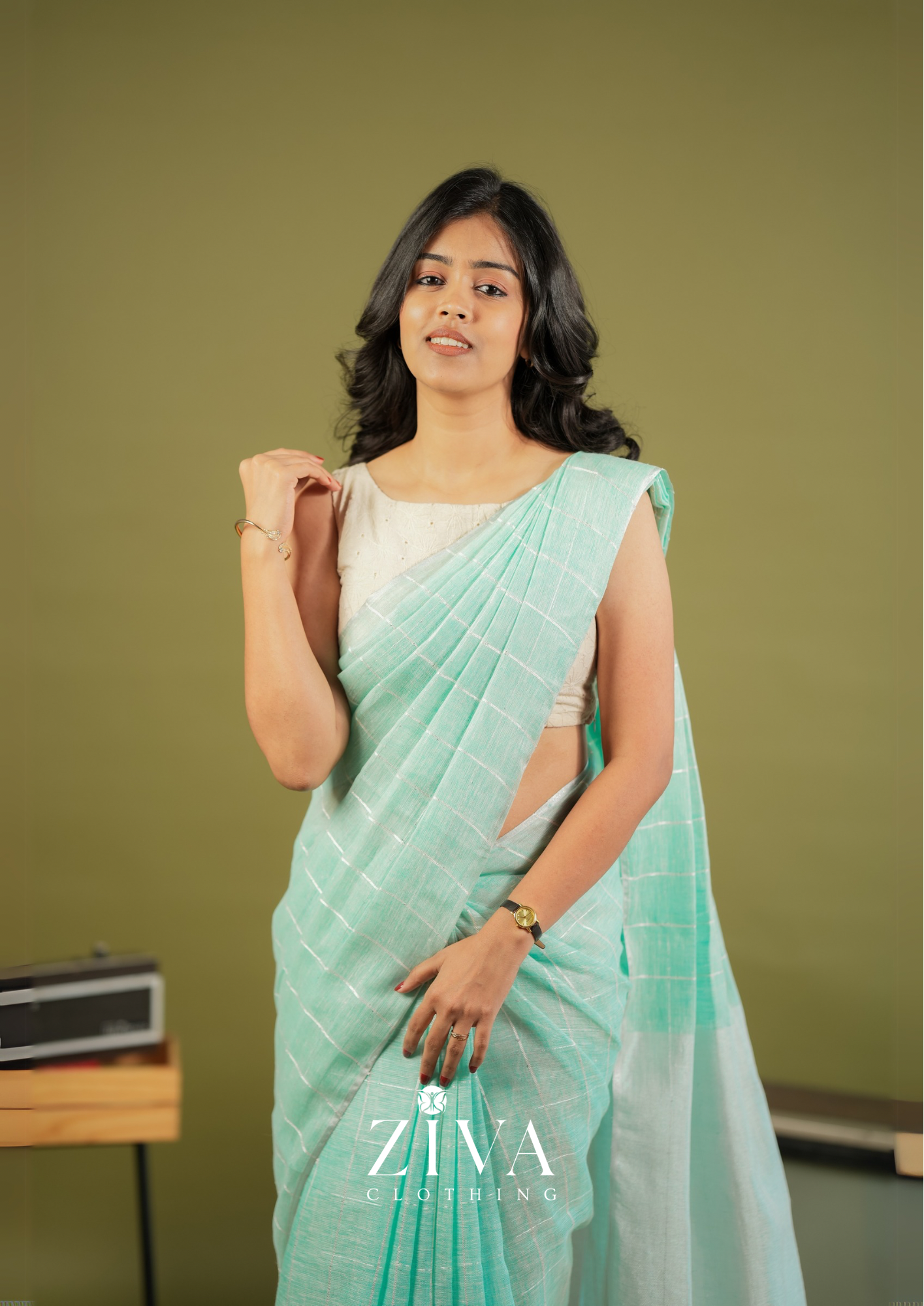 Pastel Green Linen Saree Woven With Sequins