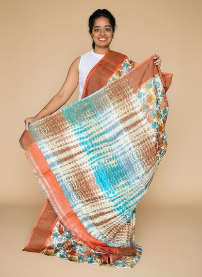 Cream and Orange Tussar Silk Saree with Prints