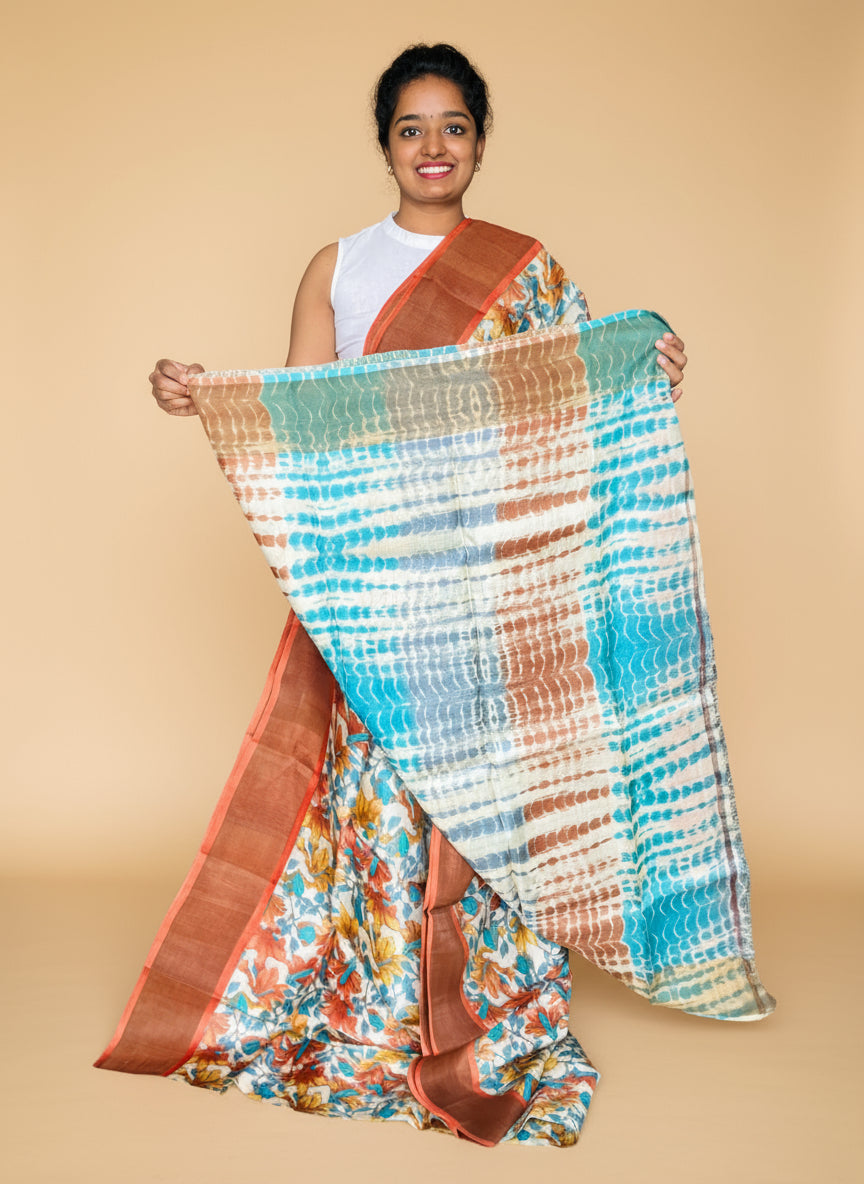 Cream and Orange Tussar Silk Saree with Prints