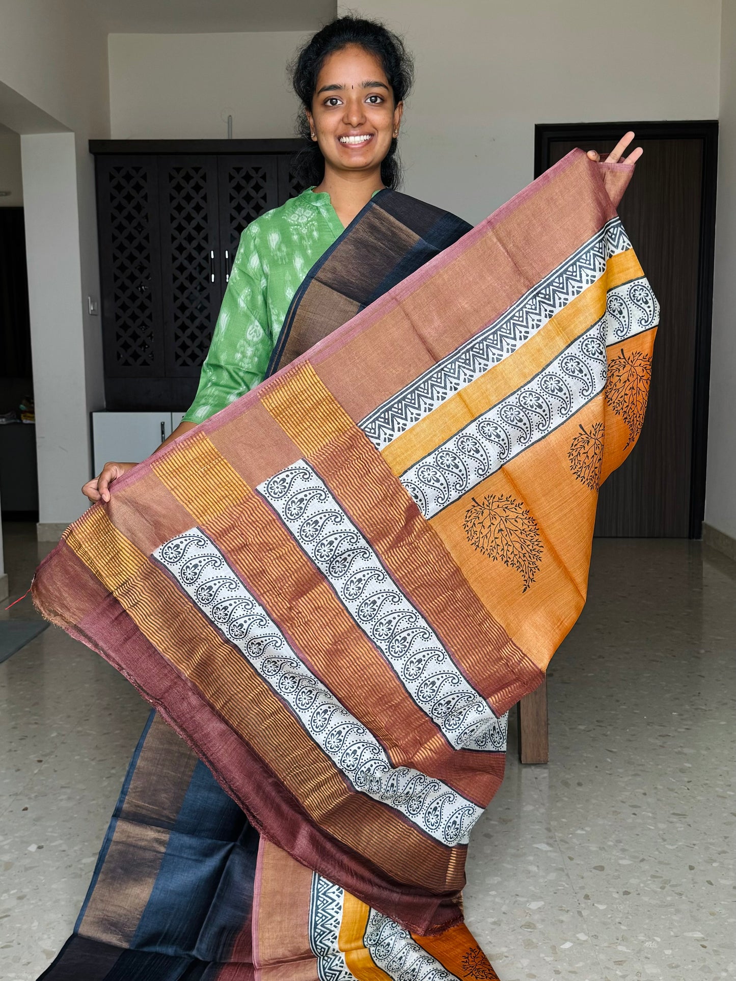 Black,Brown and Orange Tussar Silk Saree with Prints