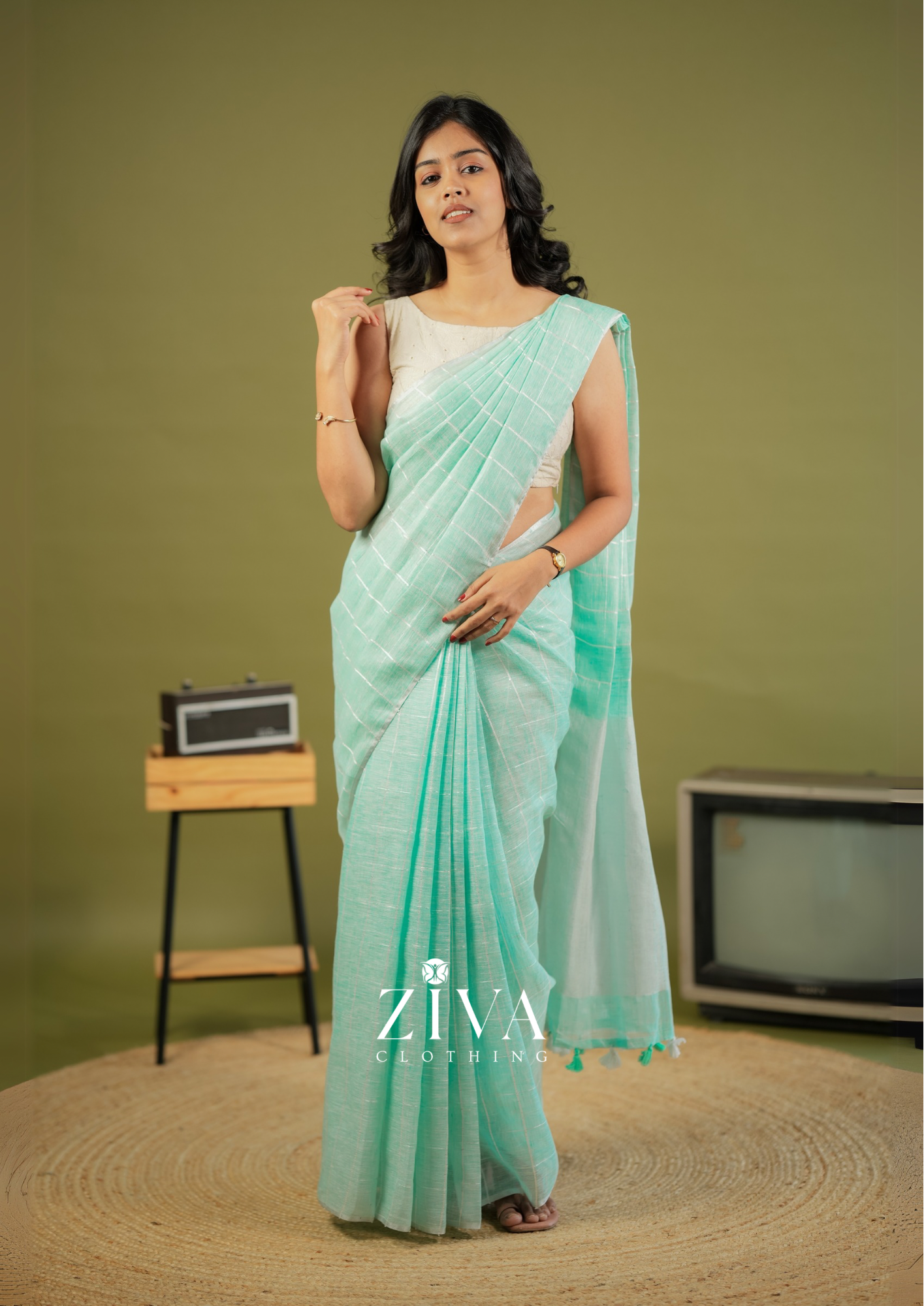 Pastel Green Linen Saree Woven With Sequins