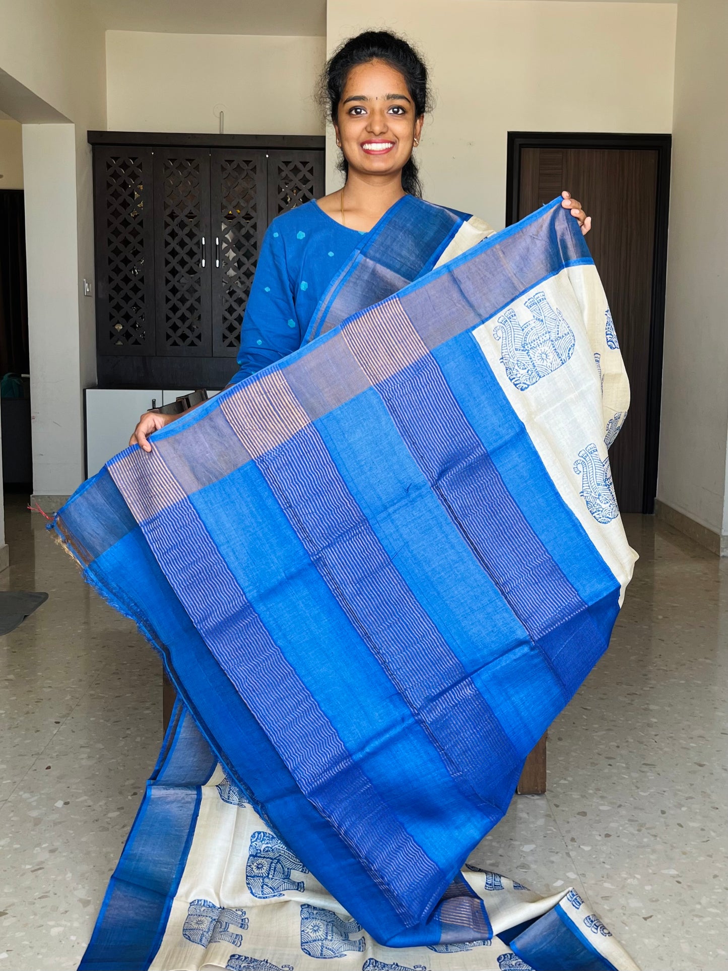 Cream and Blue Tussar Silk Saree with Prints