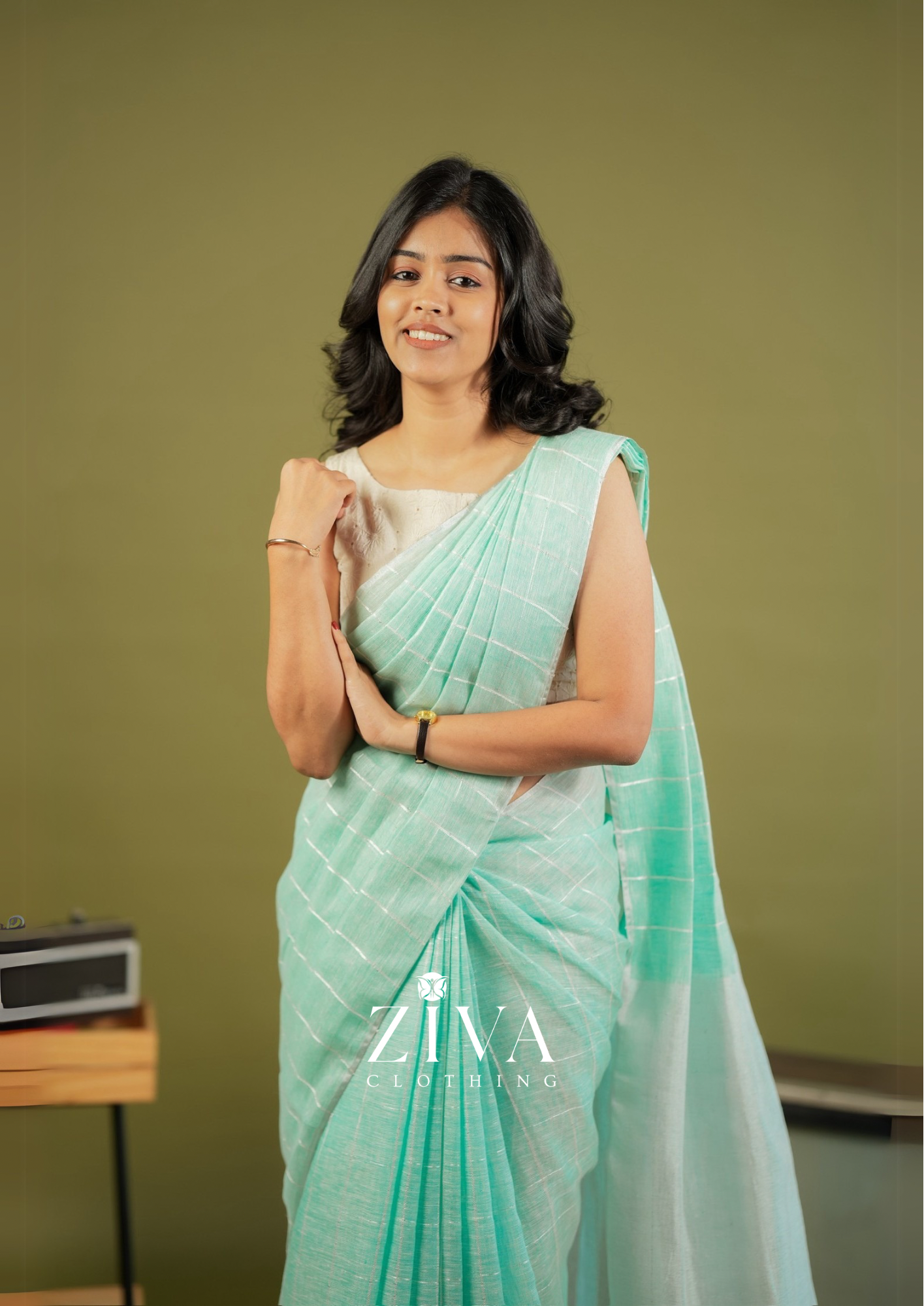 Pastel Green Linen Saree Woven With Sequins