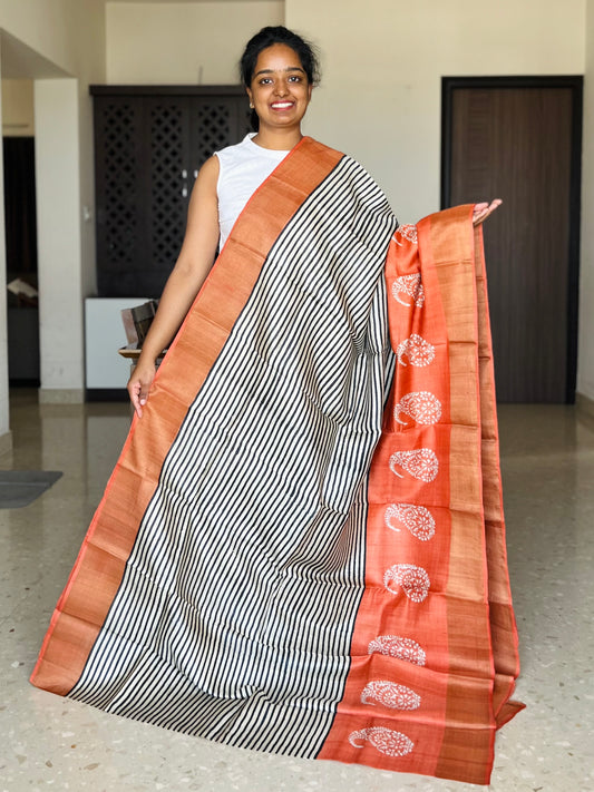 Black and Orange Tussar Silk Saree with Prints