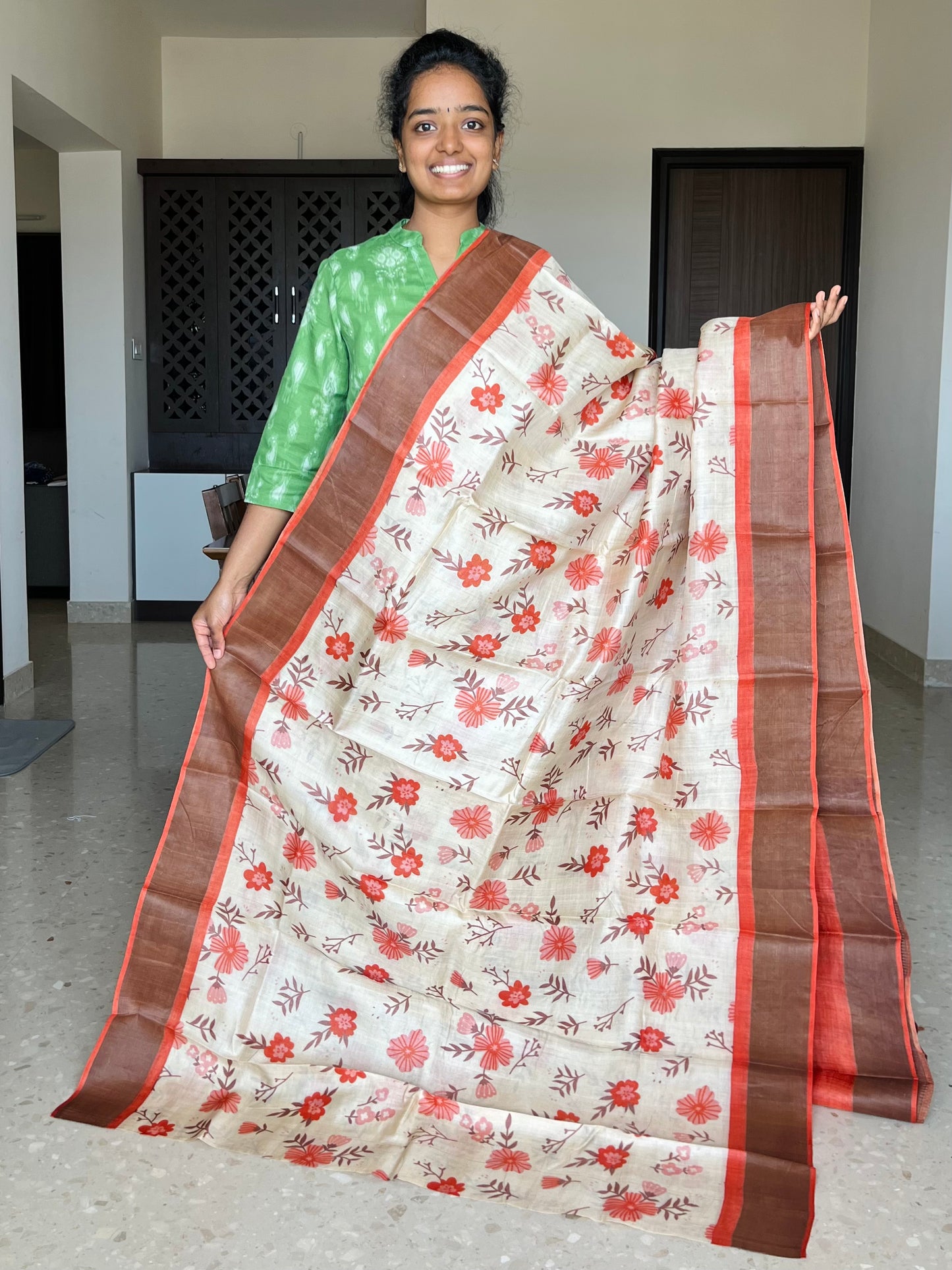 Cream and Orange Tussar Silk Saree with Prints